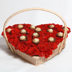 red-roses-with-ferrero-in-heart-basket